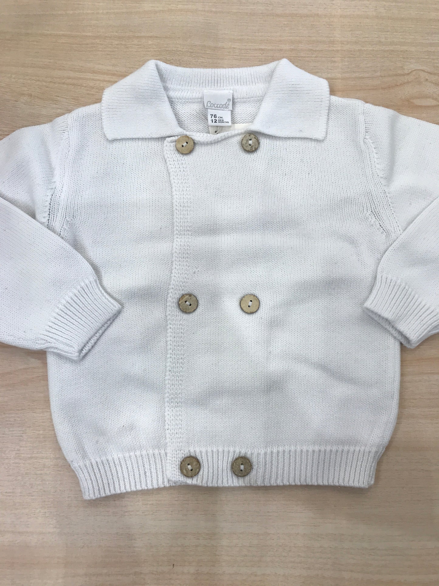 Cardigan Coccodè in filo bianco con bottoncini sul davanti