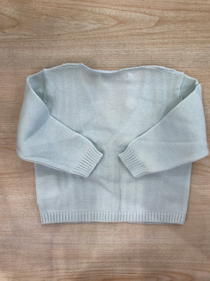 Cardigan Bebè di Almy in filo celeste chiaro con piccoli bottoncini e lavorazioni