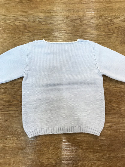 Cardigan Bebè di Almy in lana celeste con lavorazione sul davanti piccoli bottoncini e punto gambero sul davanti