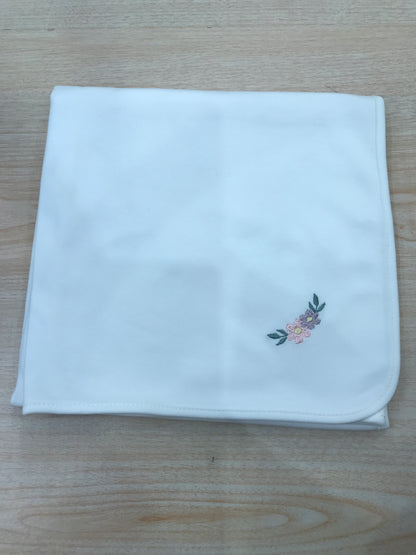 Mussola Baby Gi in cotone panna con fiore camelia ricamato
