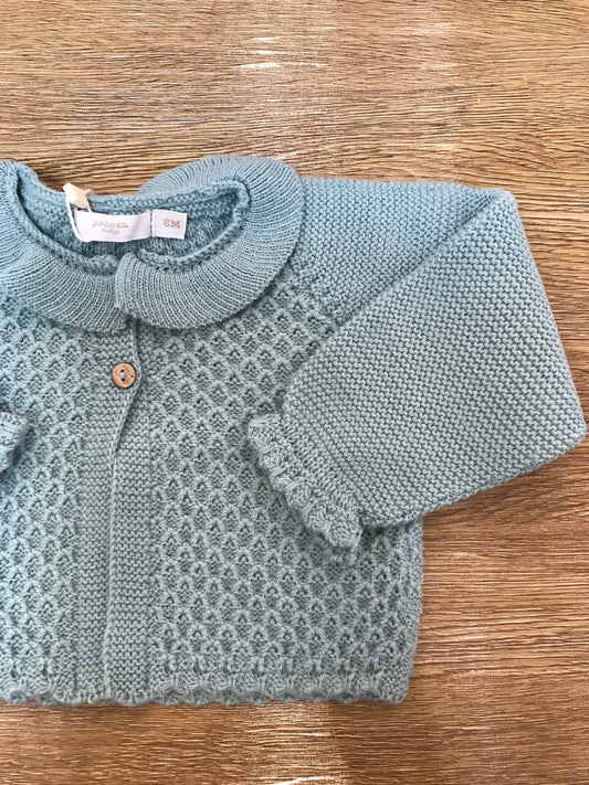 Cardigan PCS verde con collo con rusche e riccetto sul polsino