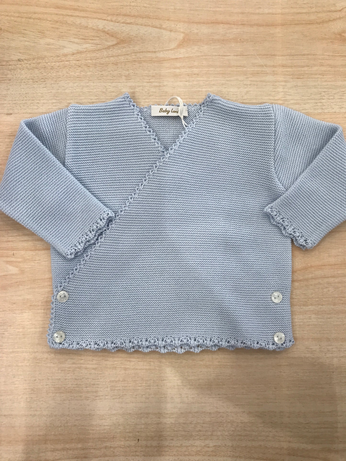 Cardigan Baby Lord in filo celeste ad incrocio smerlato