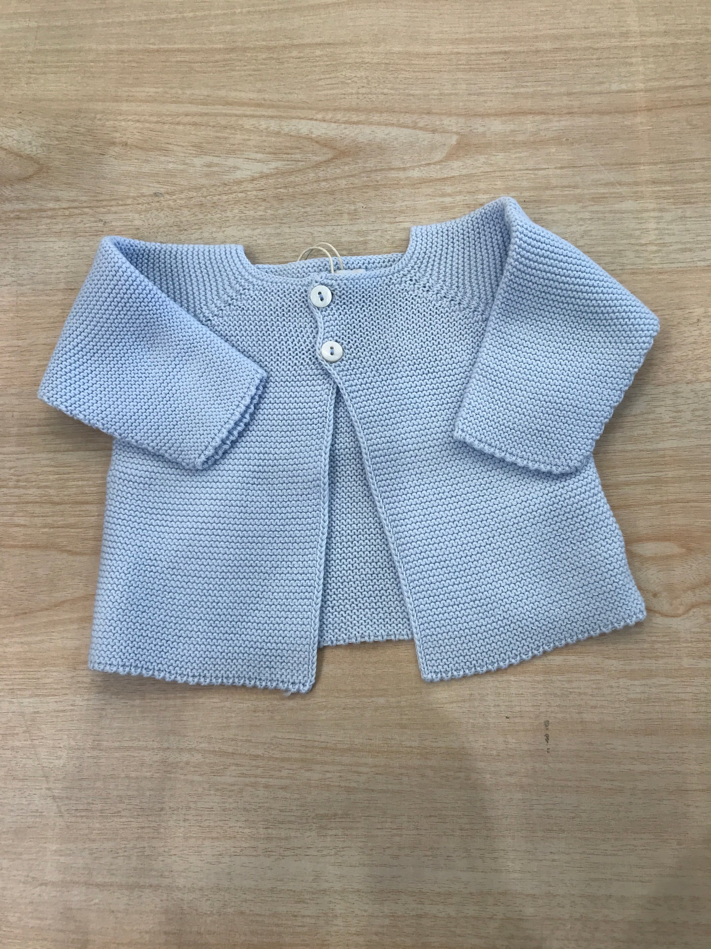Cardigan PCS in filo celeste con due bottoncini