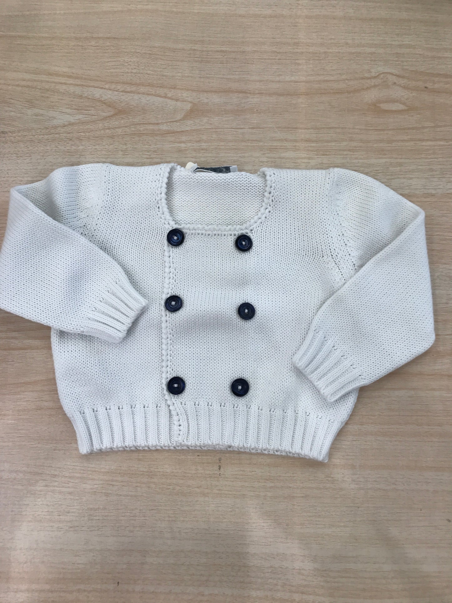 Cardigan Colibrì in filo bianco doppio petto con bottoncini blu