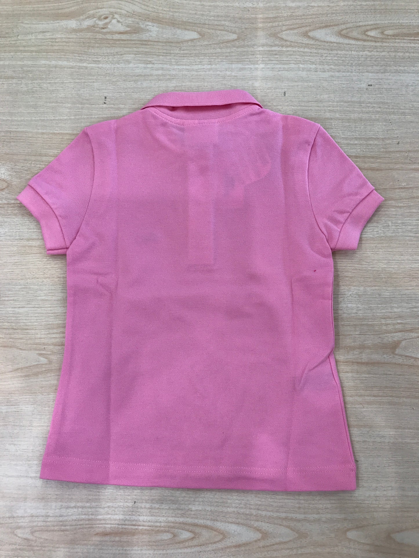 Polo Lacoste in cotone mezza manica con bottoncini e logo ricamato lateralmente unisex