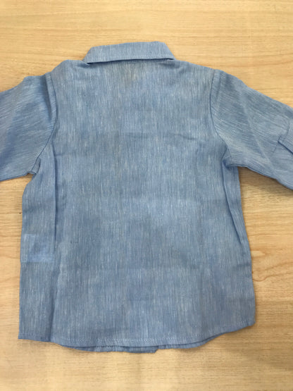 Camicia Jo Milano celeste manica lunga con pieghe sul davanti e bottoni madreperla