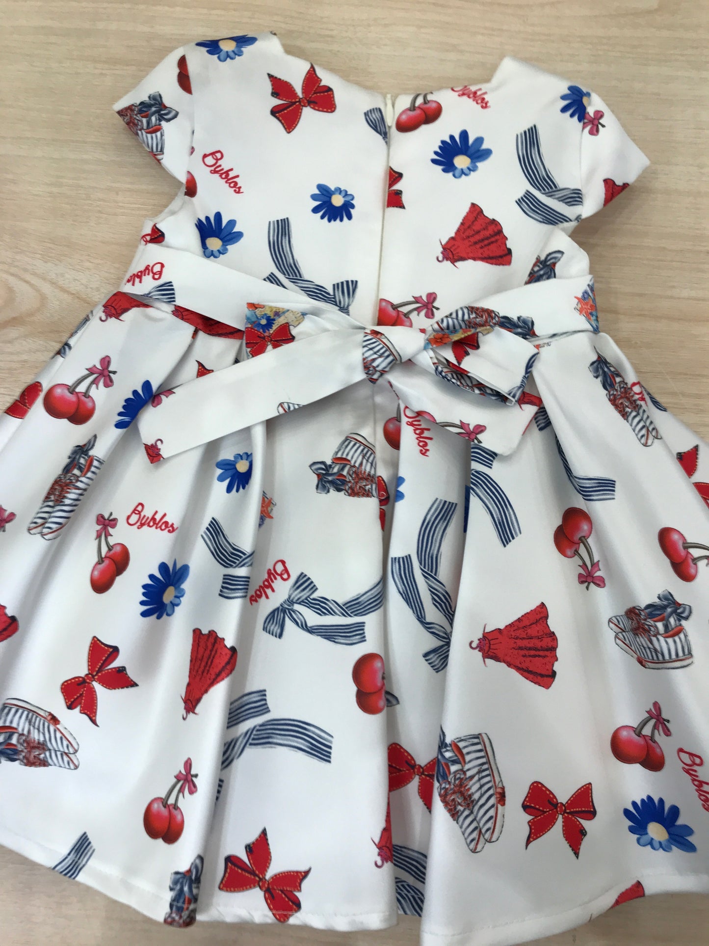 Abito Byblos mezza manica con fascia invita e fiocco sul retro con fantasie colorate