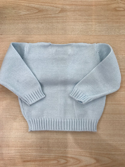 Cardigan Bebè di Almy in filo con lavorazione sul davanti