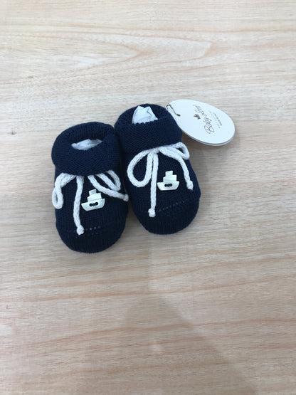 Babbucce Baby Lord in filo blu scuro con fiocchetto bianco e nave applicata sul davanti