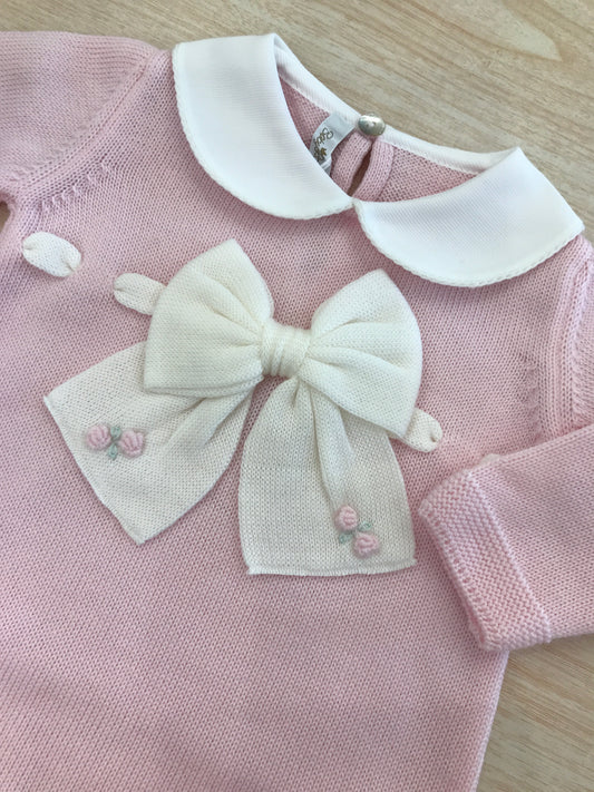 Tutina Baby Lord in lana rosa intera con passanastro e fiocco panna con roselline rosa ricamate a mano