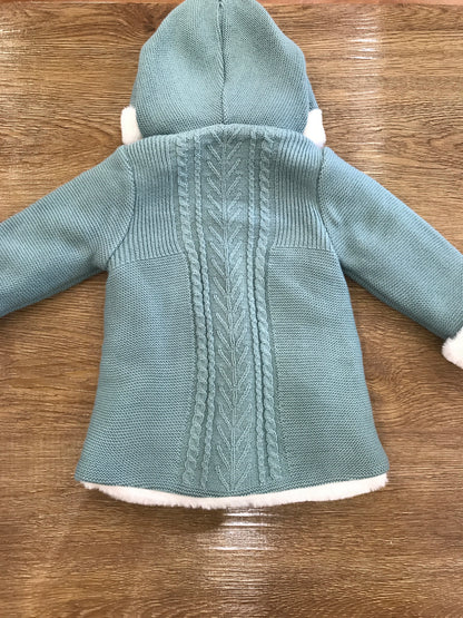 Cappotto PCS verde con fiocchetti e trecce con cappuccio e pelliccia interna
