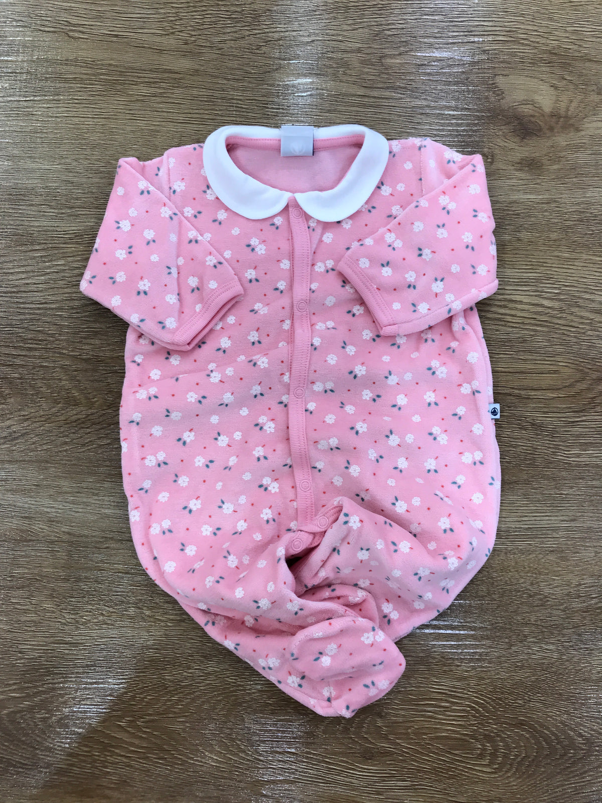 Tutina Petit Bateau in ciniglia intera con fiorellini e bottoni sul davanti