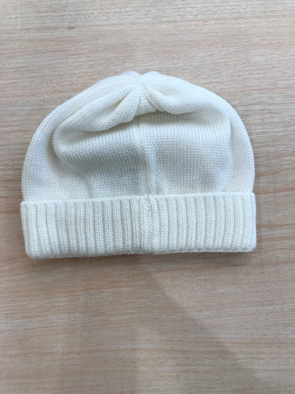 Cappello Baby Lord in lana panna con risvolto ed orsetto applicato sul davanti