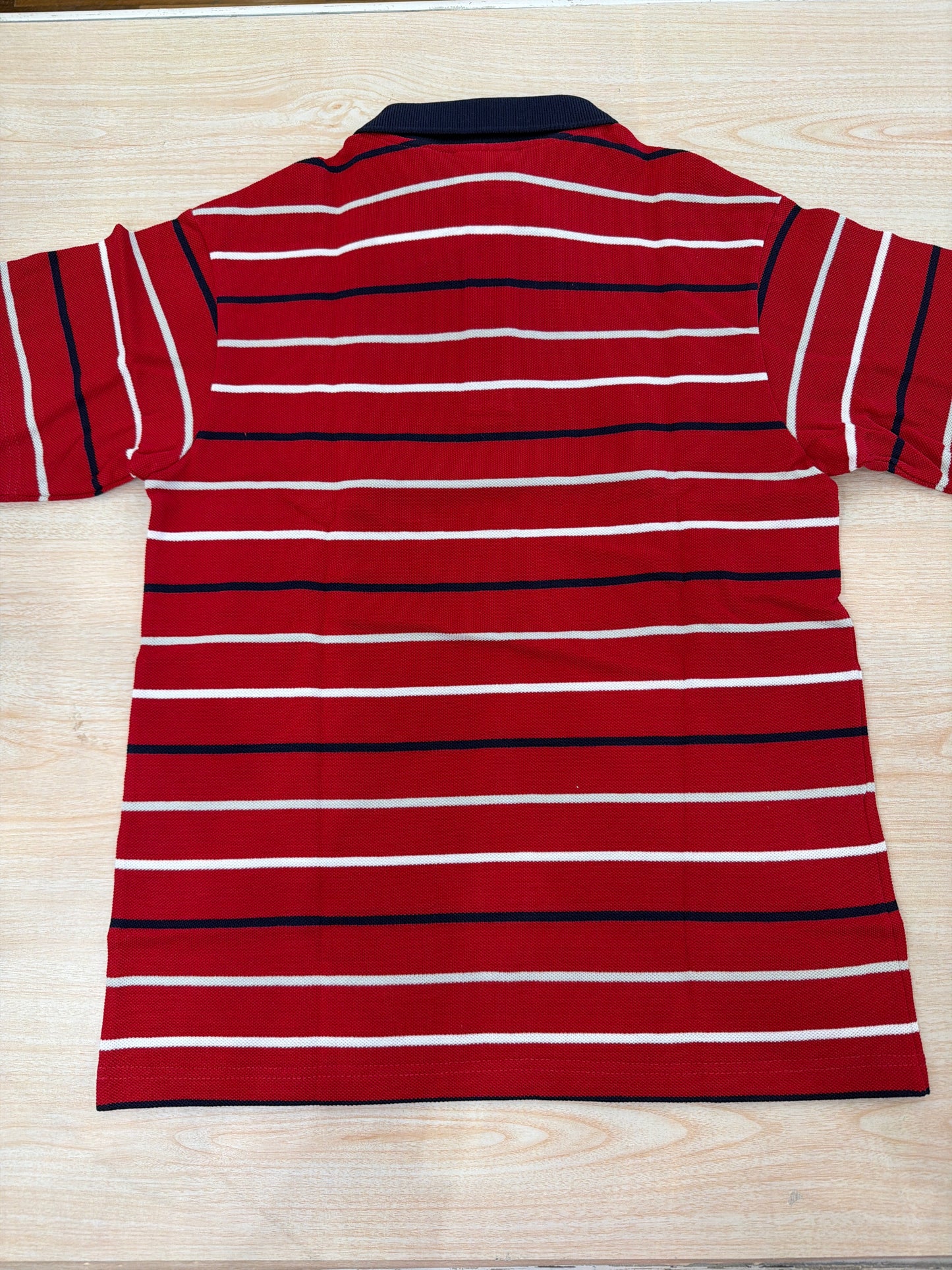 Polo Lacoste in cotone mezza manica con bottoncini e logo ricamato lateralmente unisex