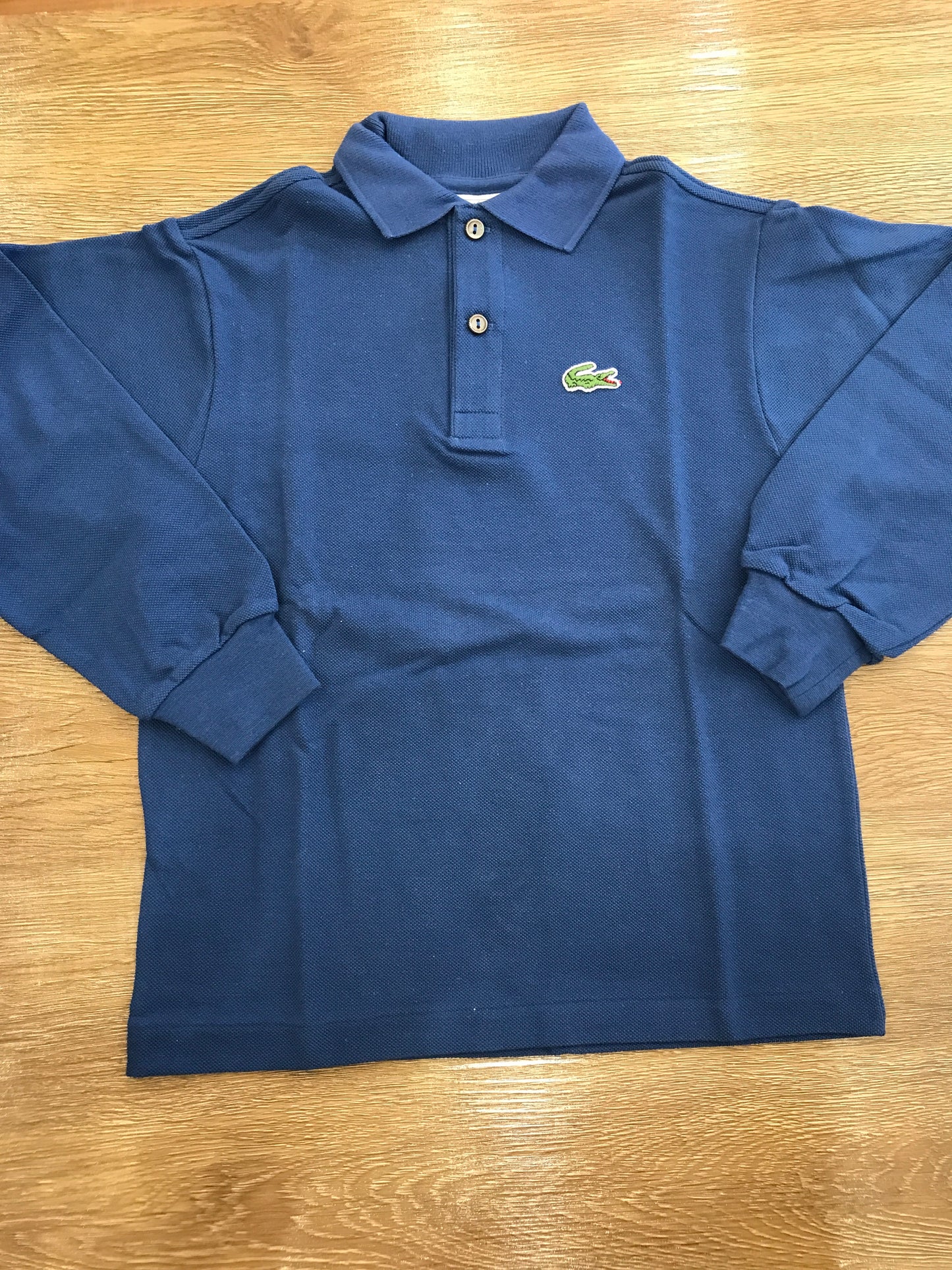 Polo Lacoste manica lunga con polsini e bottoncini