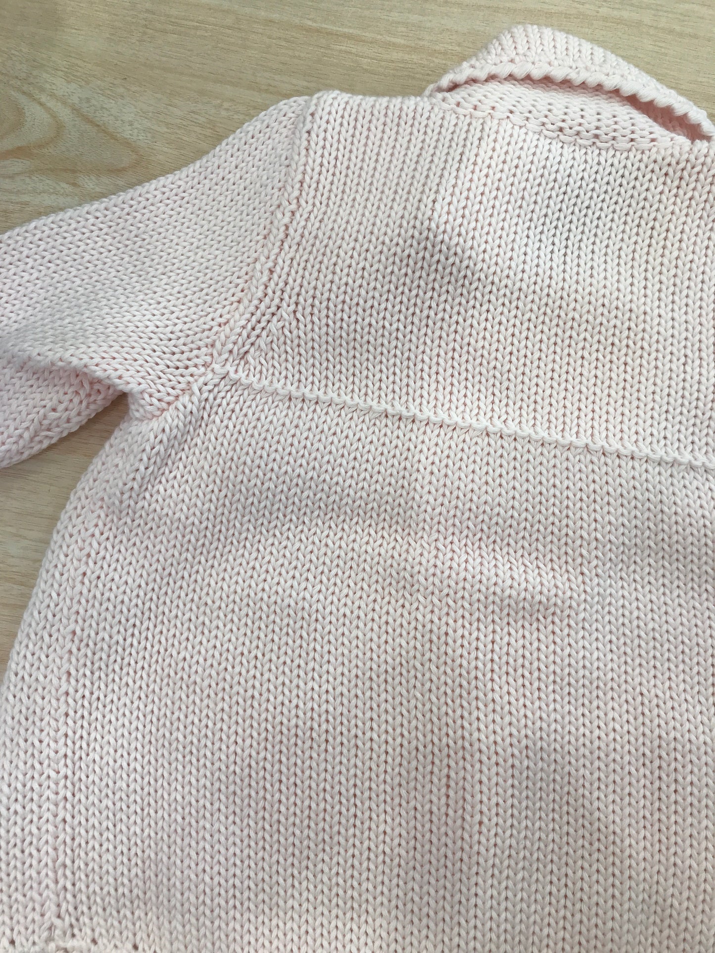 Cappotto Colibrì rosa chiaro in filo con bottoncini doppio petto