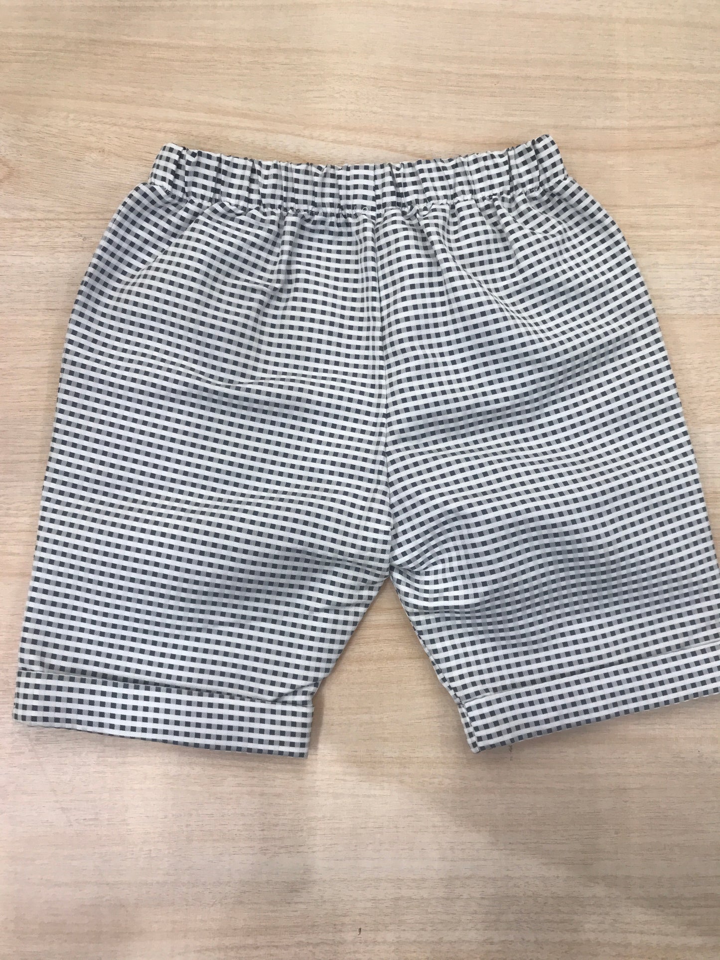 Pantalone Colibrì alla zuava con elastico in vita e quadretti bianche e blu