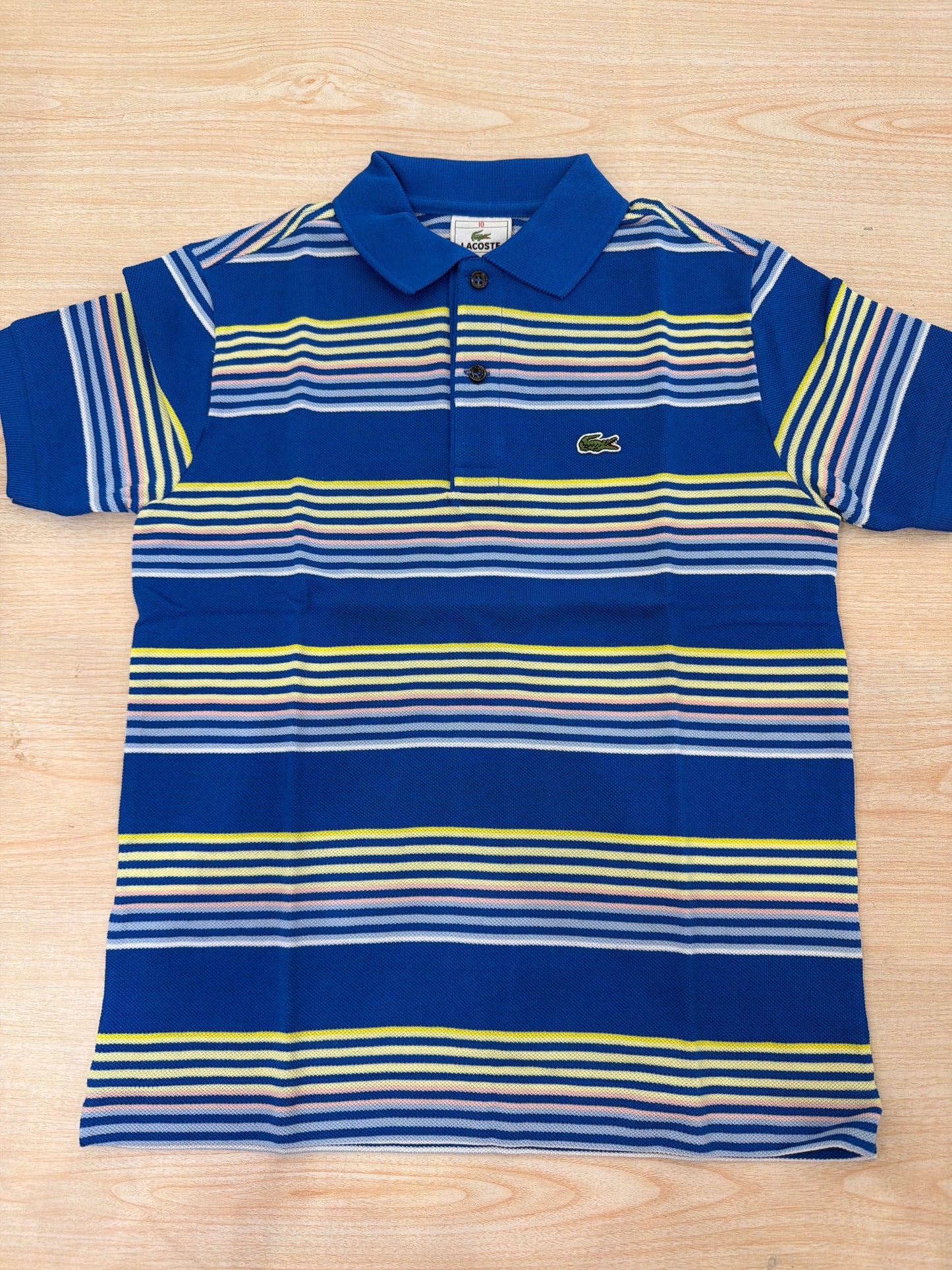Polo Lacoste in cotone mezza manica con bottoncini e logo ricamato lateralmente unisex