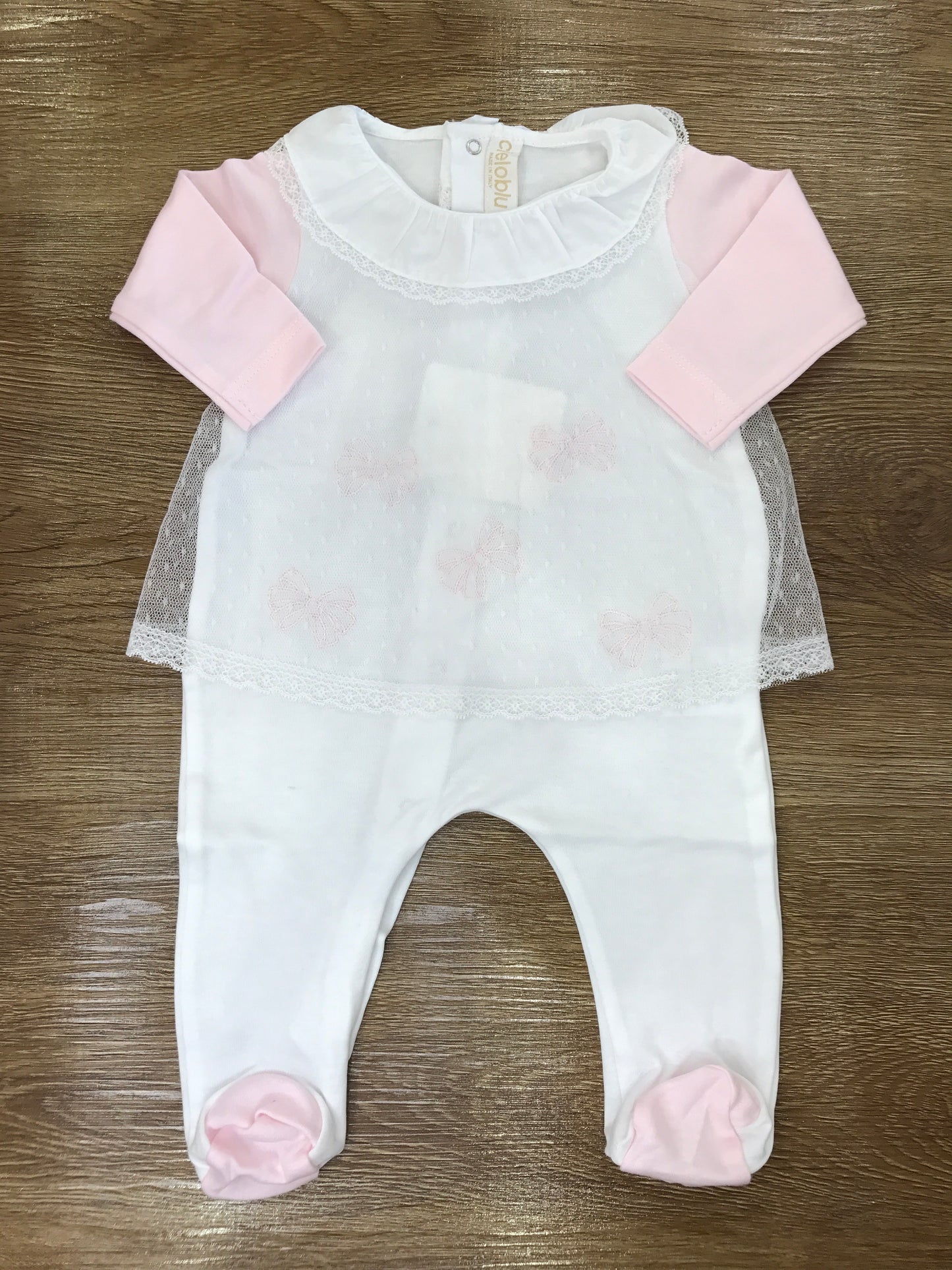 Tutina Cielo Blu intera bianca con fiocchetti rosa e velo in tulle