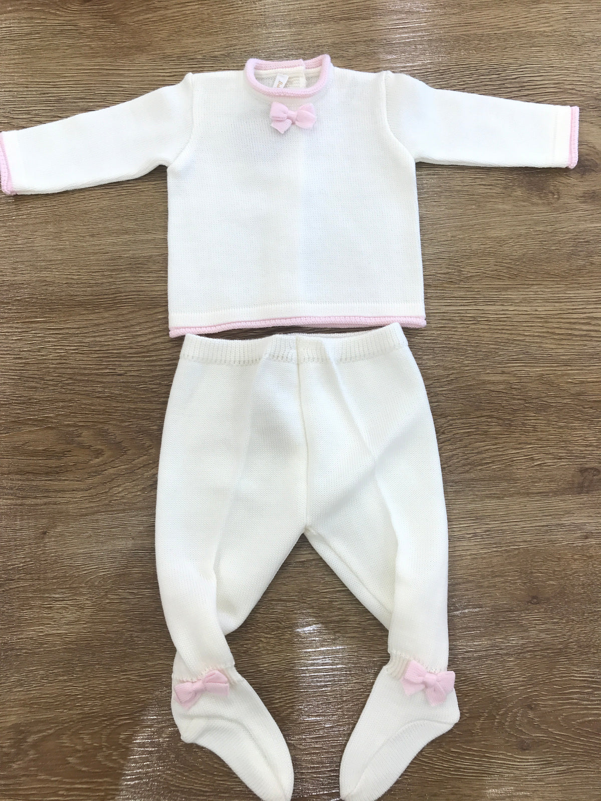 Tutina Baby Lord in lana panna due pezzi con piccoli fiocchetti rosa