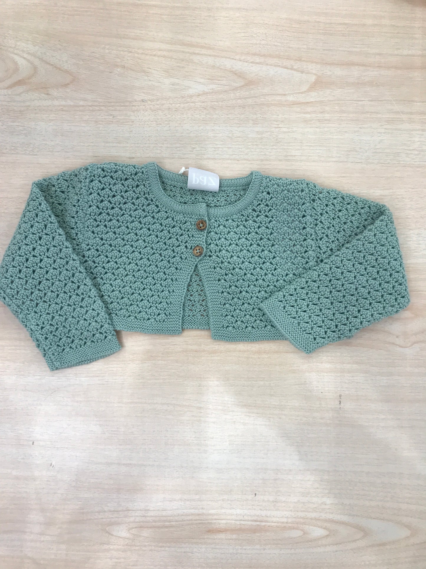 Cardigan Paz Rodriguez in filo traforato verde con due piccoli bottoni in legno