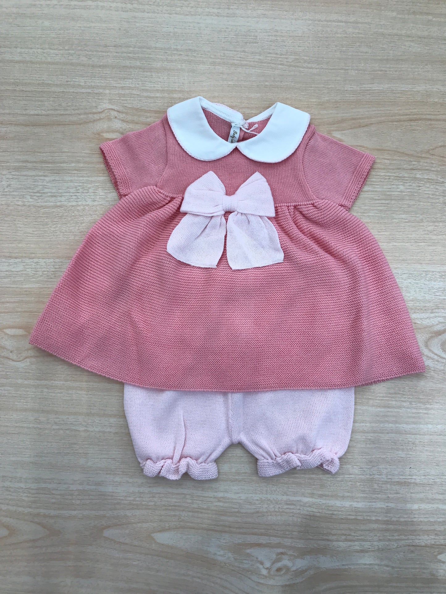 Completo Baby Lord in filo due pezzi corallo e rosa mezza manica con fiocco centrale rosa