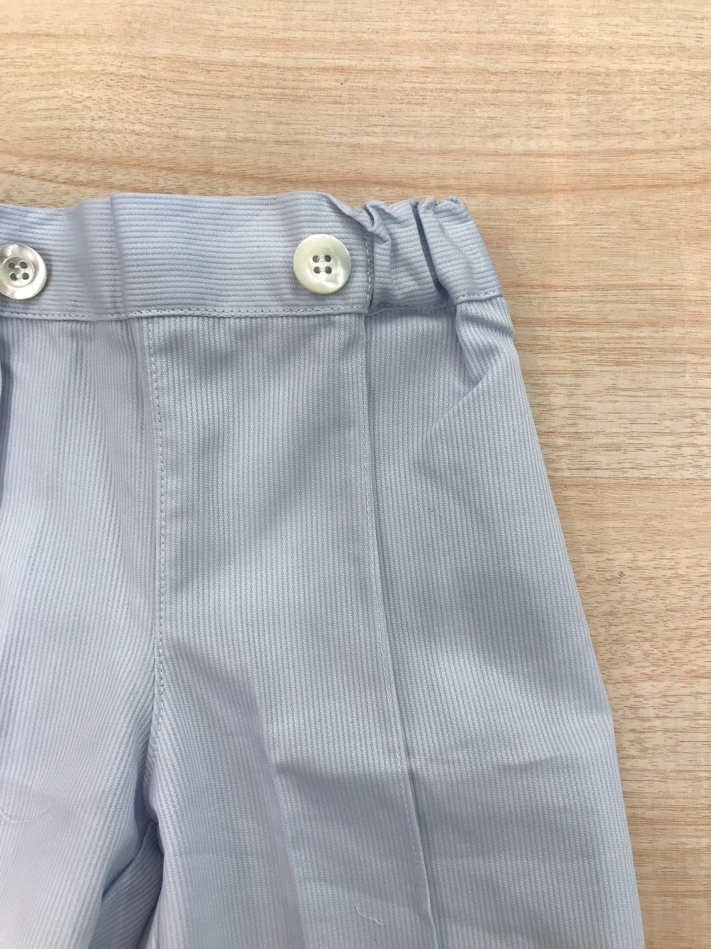 Pantalone Bebè di Almy in cotone celeste rigato con elastico in vita e bottoncini