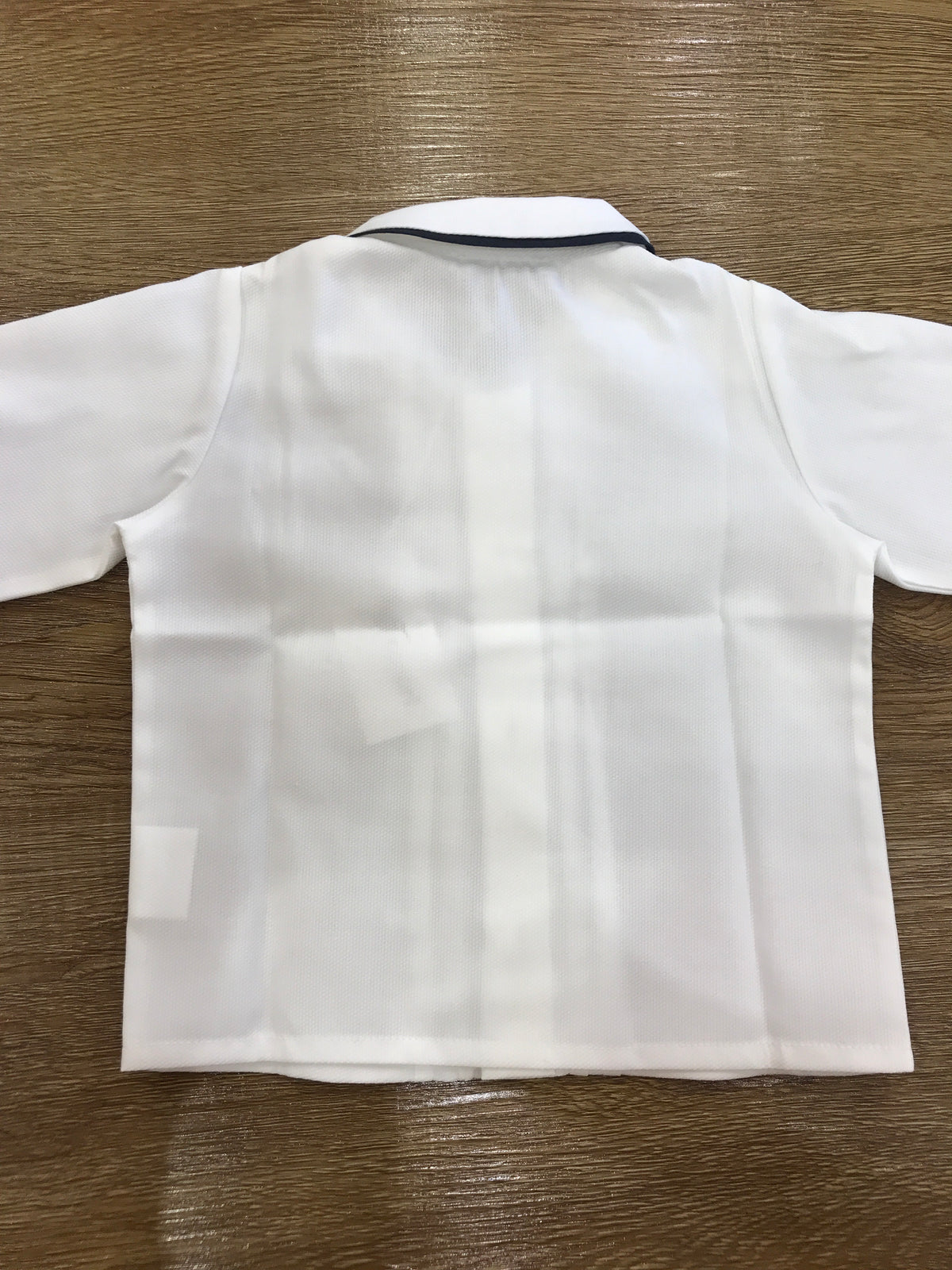 Camicia Colibrì bianca con colletto e polsini dal profilo blu scuro con pois in rilievo