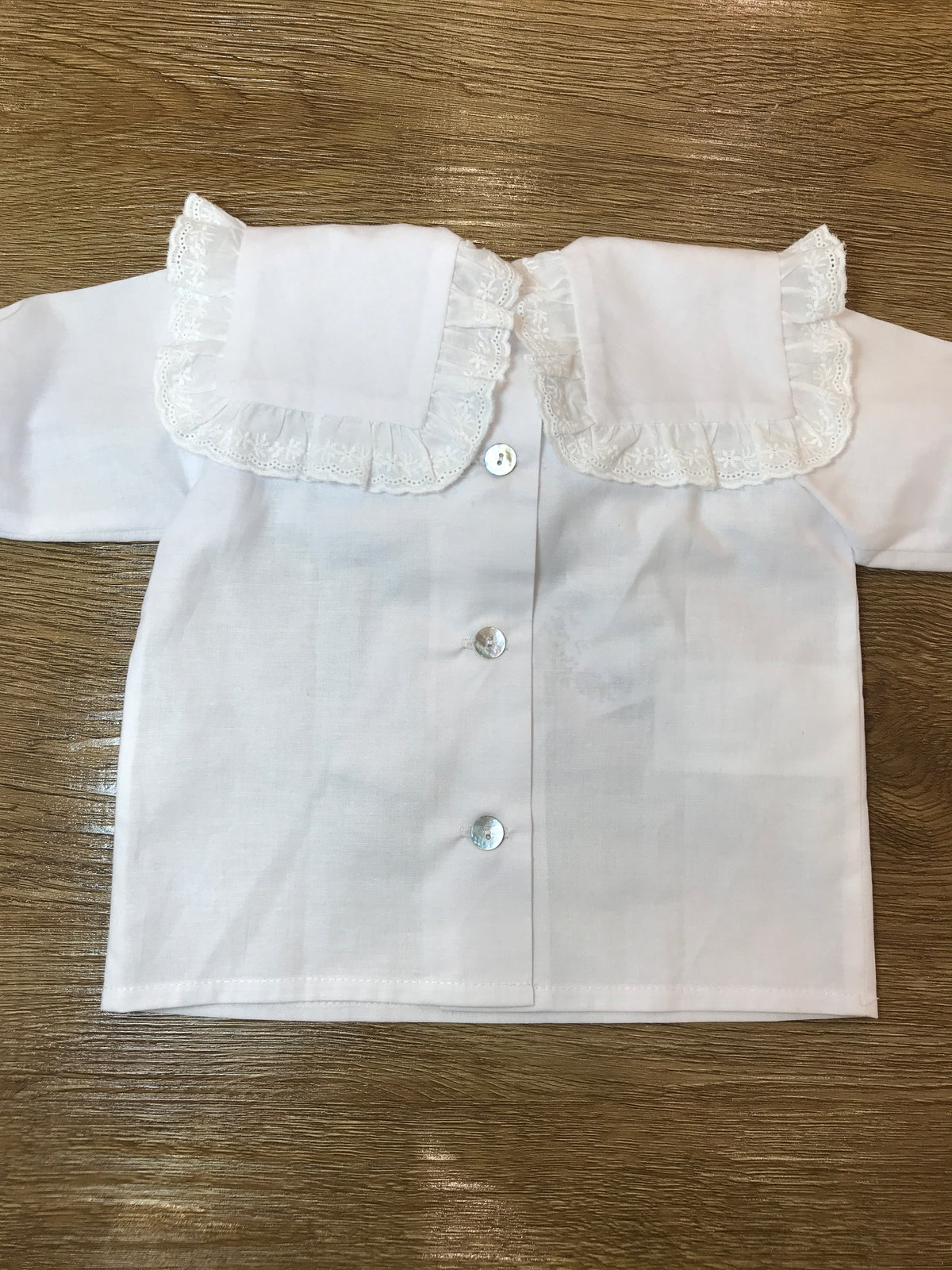 Camicia Fofettes bianca manica lunga con collo con rusche e fiocco in velluto rosa