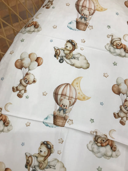 Mussola Nannafrufrù in cotone di bamboo di fondo panna con orsetti nei toni neutri con palloni e nuvolette