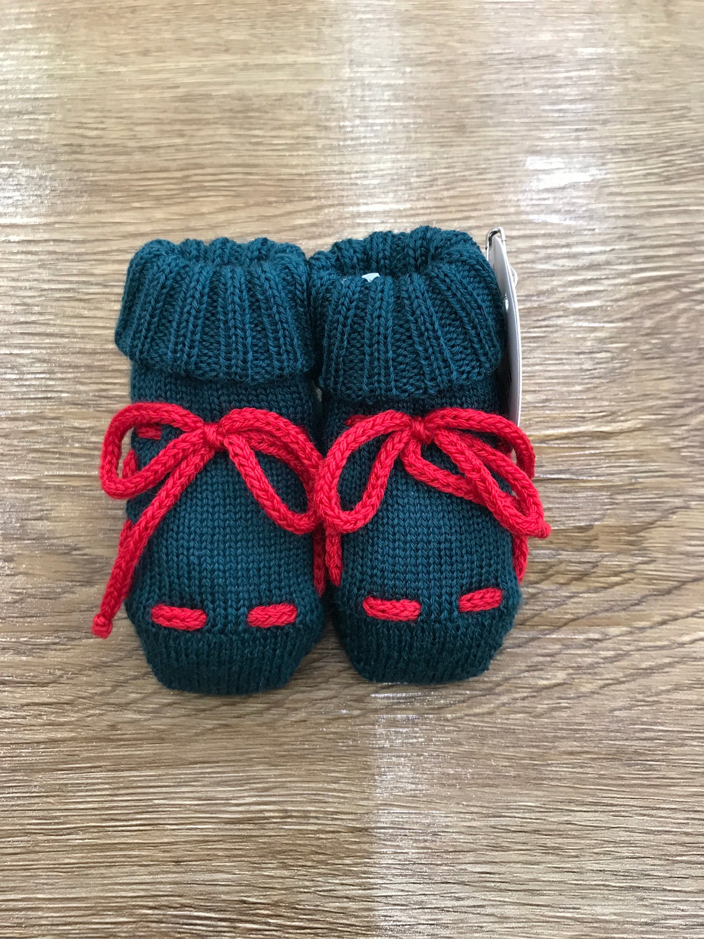 Babbucce Baby Lord in lana verde scuro con laccio passanastro rosso