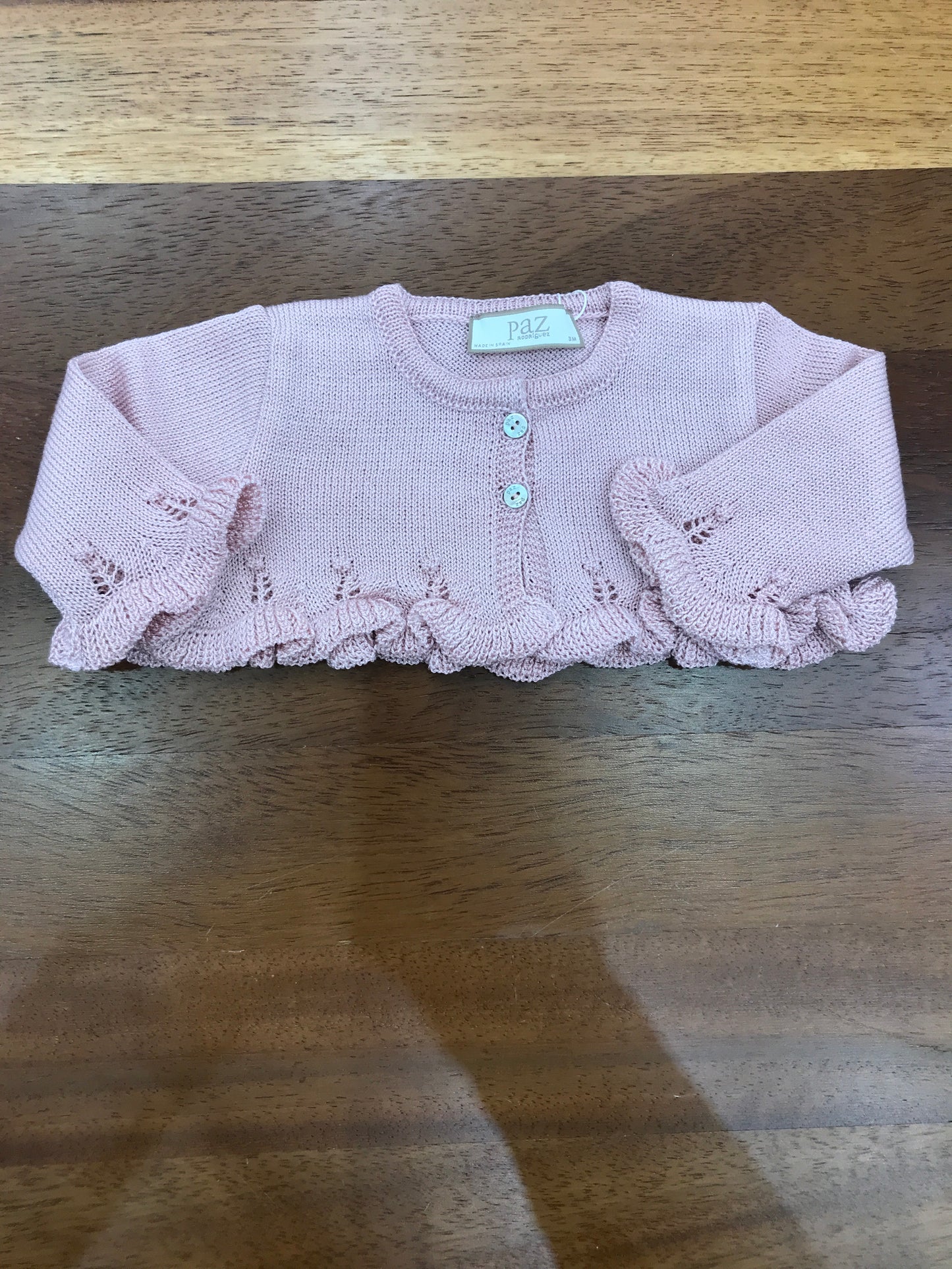 Cardigan Paz Rodriguez in filo rosa antico con manica lunga con rusche traforata con rusche al bordo