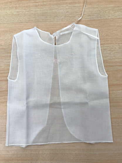 Camicino Baby gi in cotone bianco smanicato con pois e fiocchetto rosa ricamato