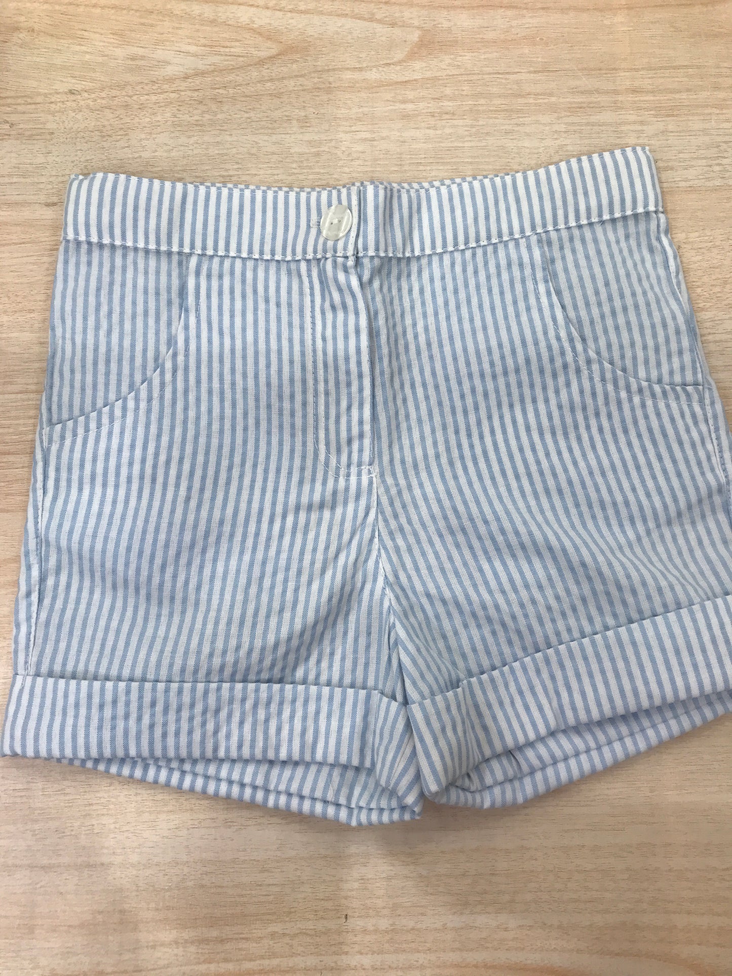 Pantalone Coccodè in cotone a righe bianche e celesti con risvolto e tasche laterali