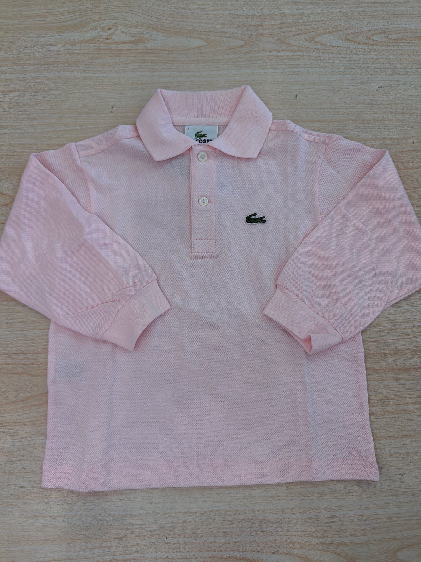 Polo Lacoste in cotone manica lunga con bottoncini e logo ricamato lateralmente unisex