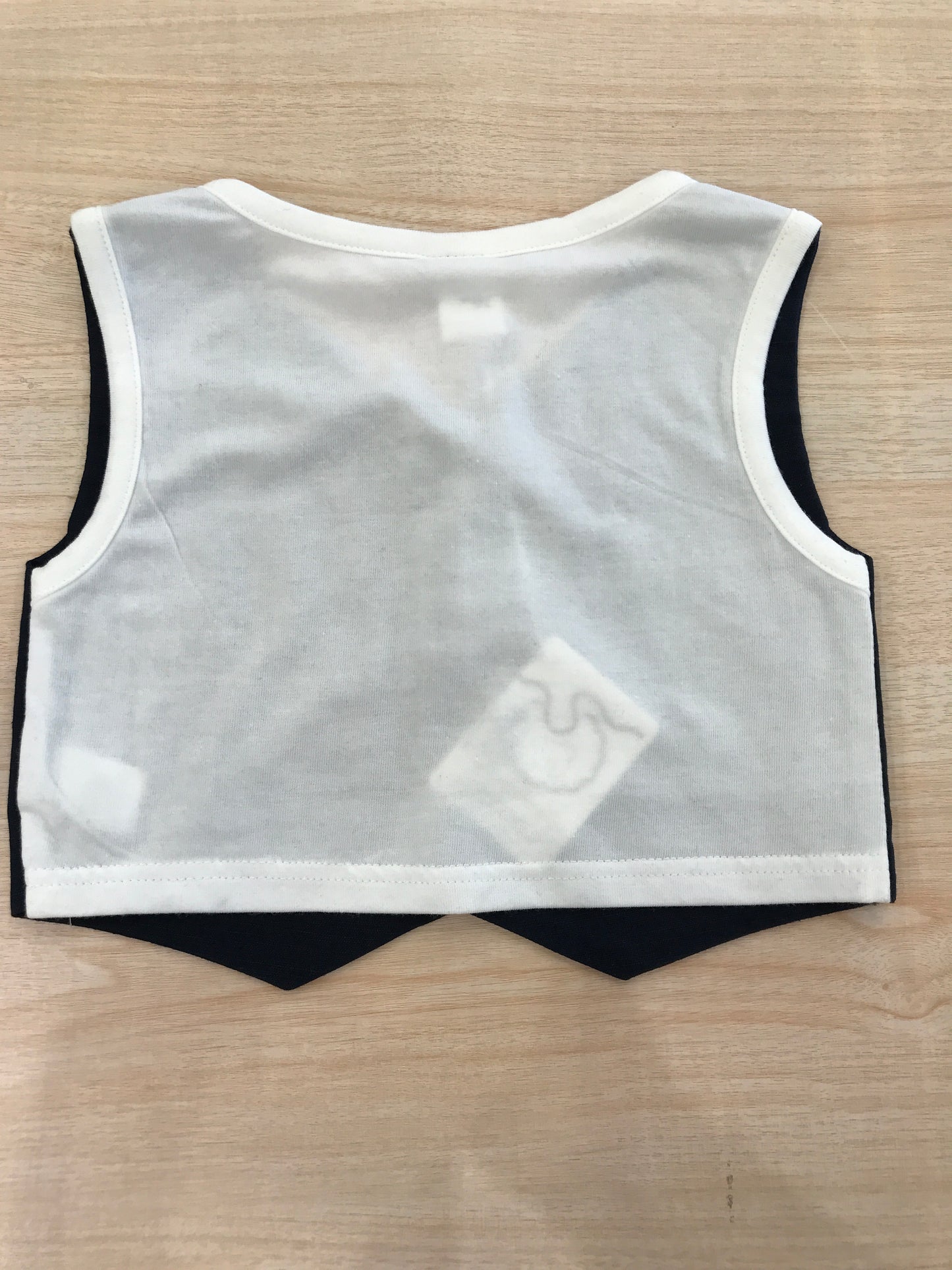 Gilet Coccodè blu scuro con bottoncini e bianco sul retro