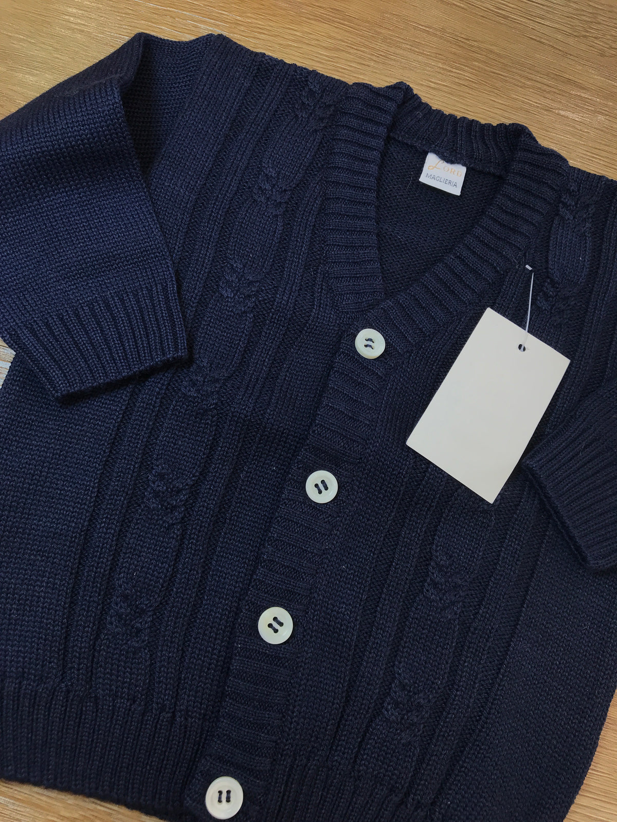 Cardigan Baby Lord in lana blu scuro con piccoli bottoncini sul davanti