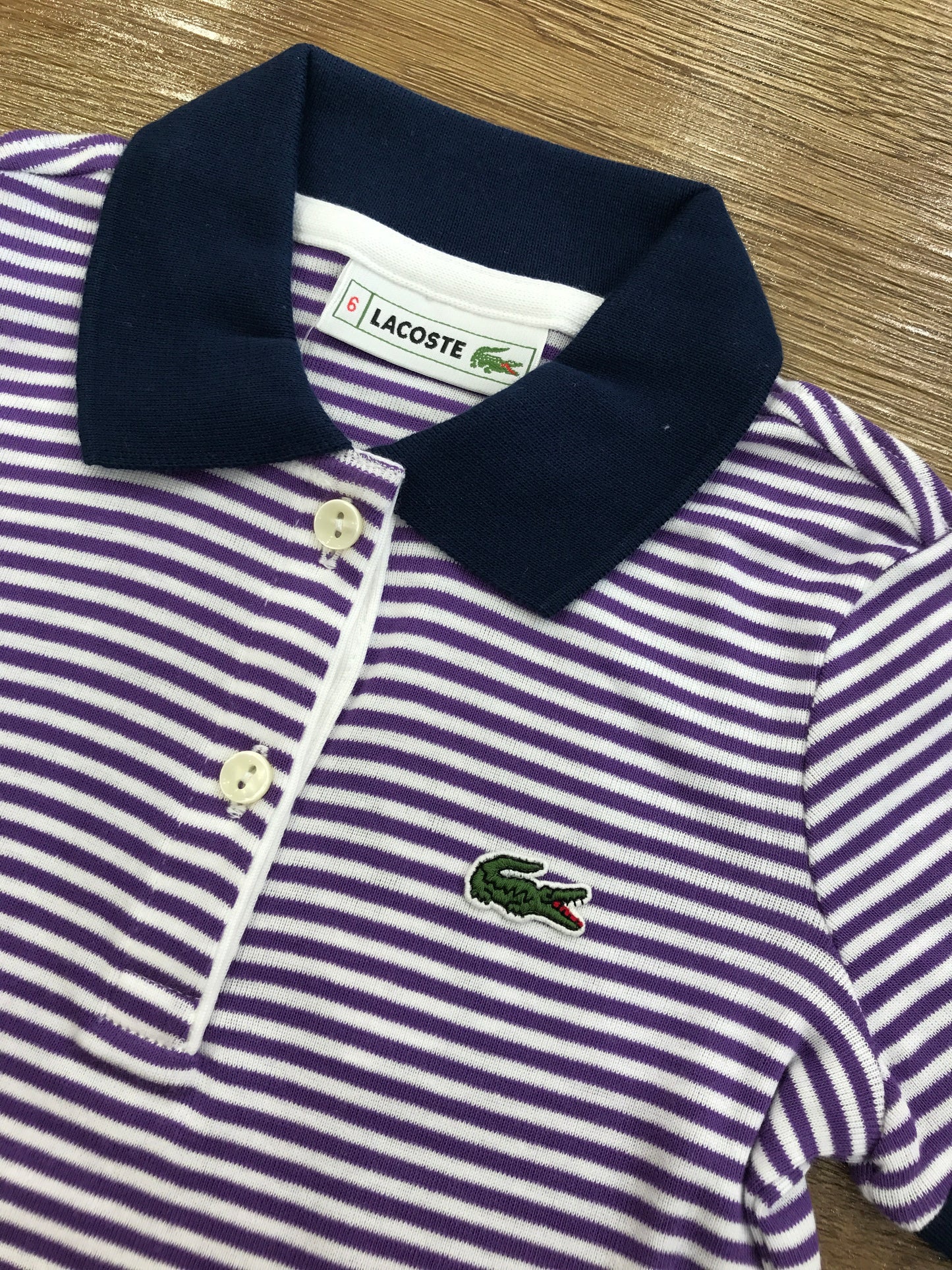 Polo Lacoste mezza manica a righe con polsini e bottoncini