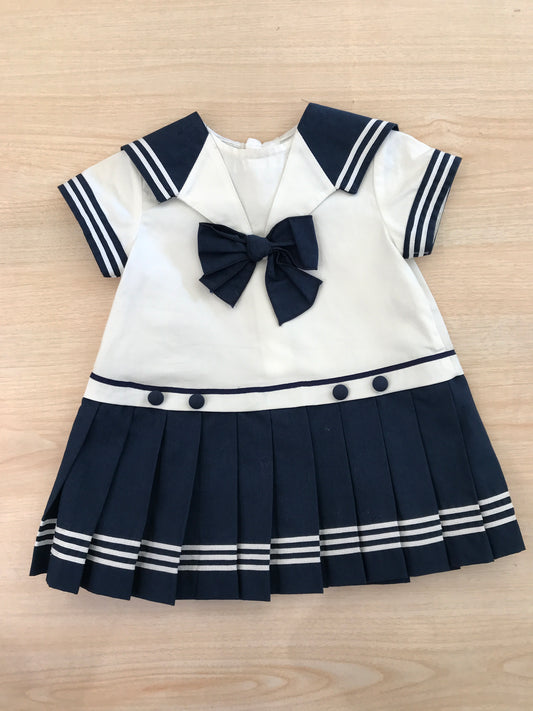 Abito Cielo Blu in cotone stile marinaretto gonna a pieghe blu con righe bianche con fiocco blu