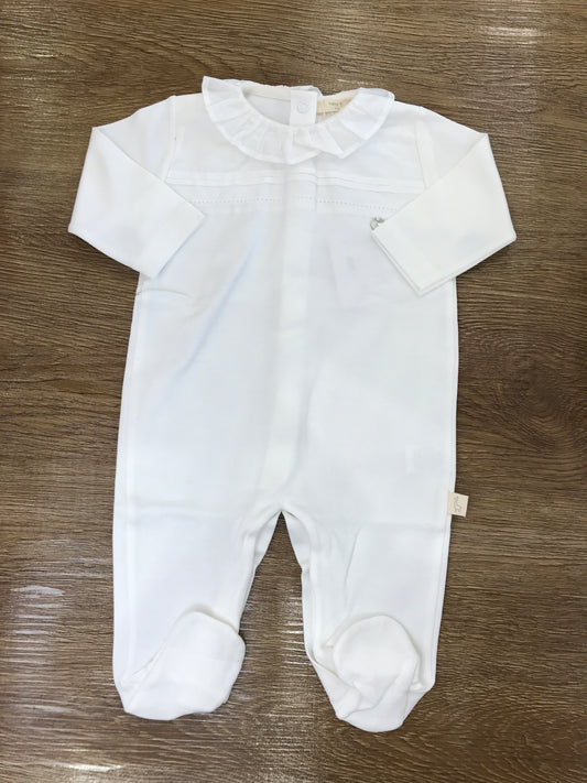 Tutina Baby Gi in cotone panna con rusche e ricamo centrale