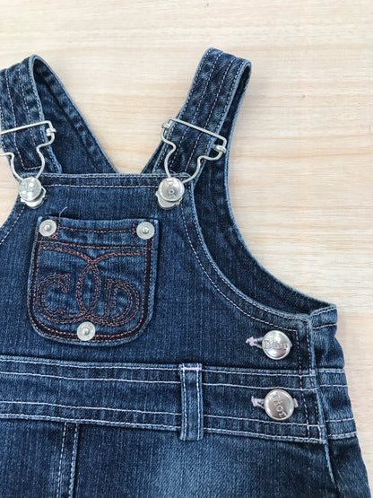 Salopette Baby Dior in jeans scuro  con bretelle e taschina sul davanti