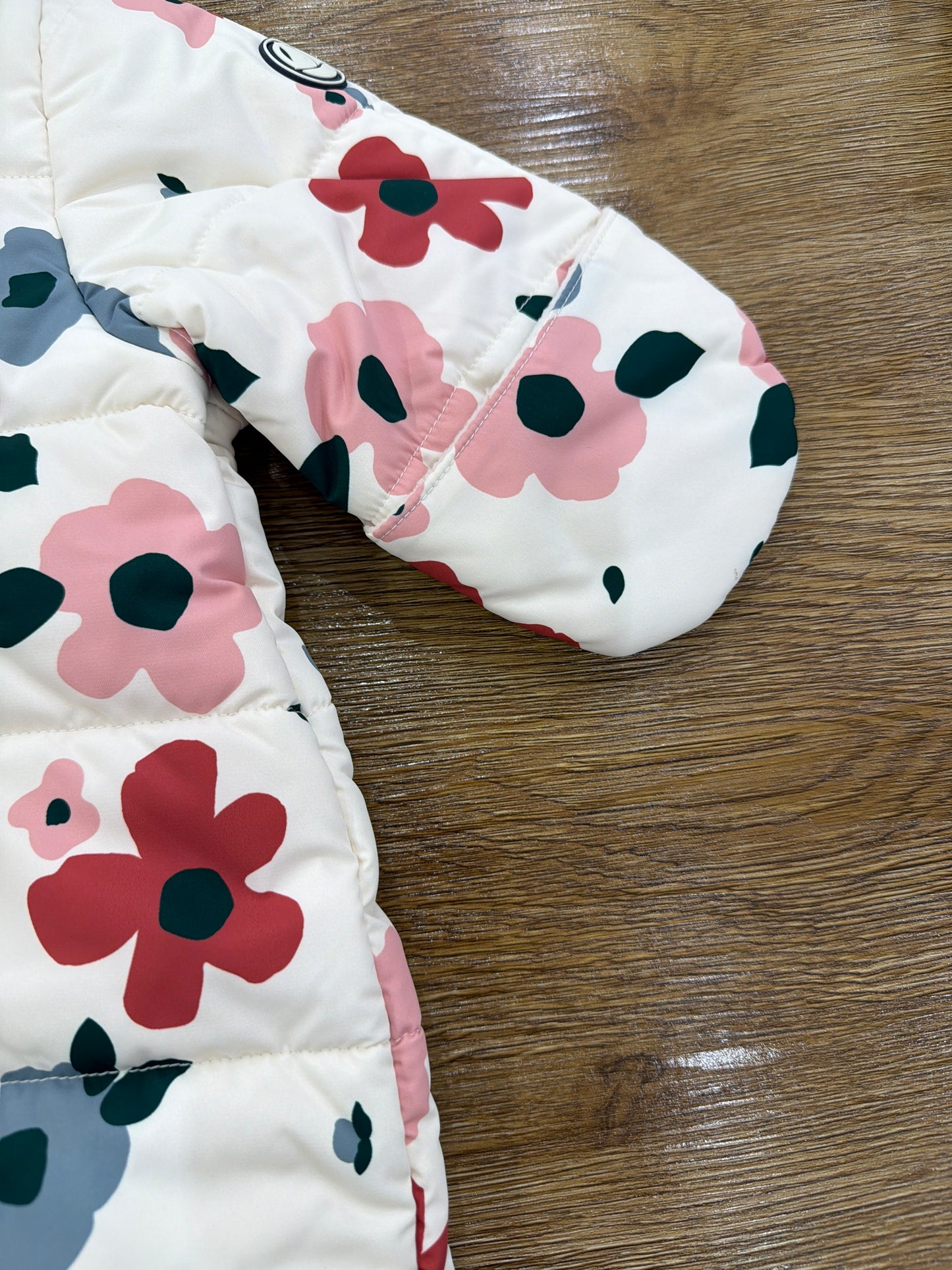 Eskimo Petit Bateau intero impermeabile imbottino con chiusura trasversale con cappuccio e decorato da fiorellini