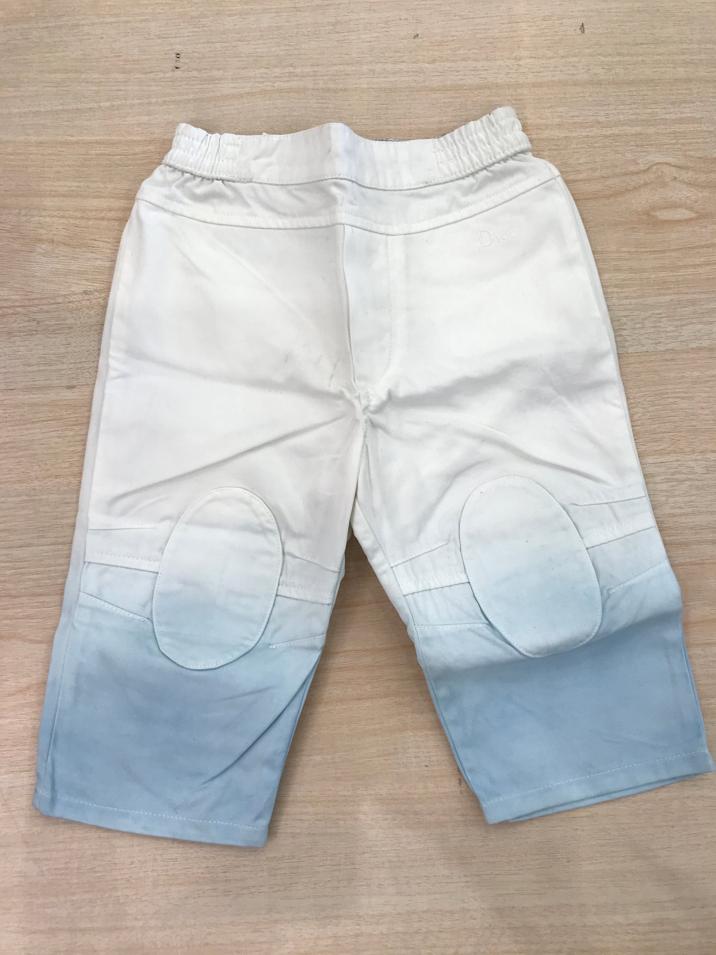 Pantalone Baby Dior in cotone bianco e celeste sfumato