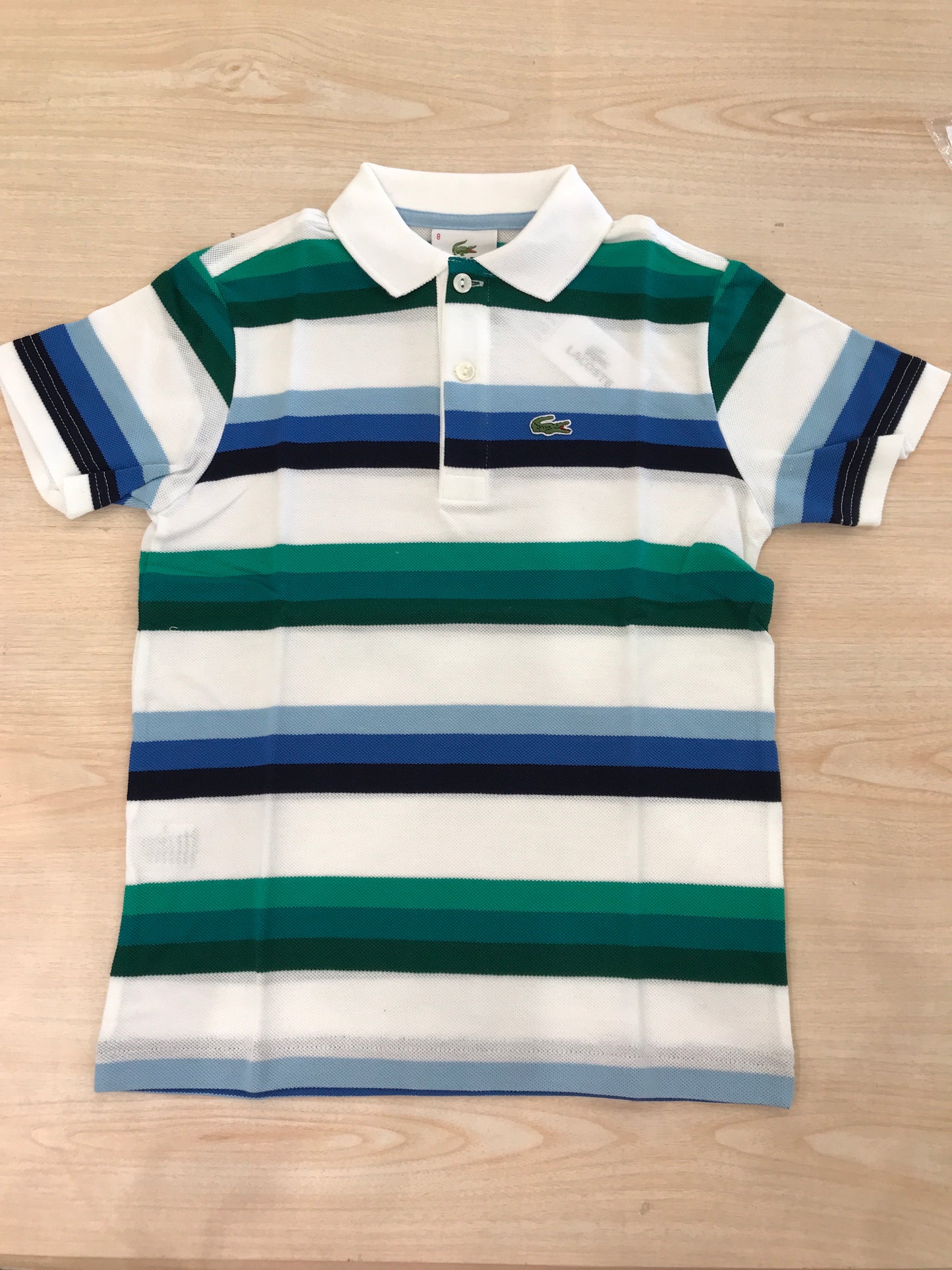 Polo Lacoste in cotone mezza manica con bottoncini e logo ricamato lateralmente unisex