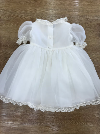 Abito Piccola Giuggiola in organza in seta panna con applicazione di valancienne e rose in 3D ricamate sul davanti con fiocco