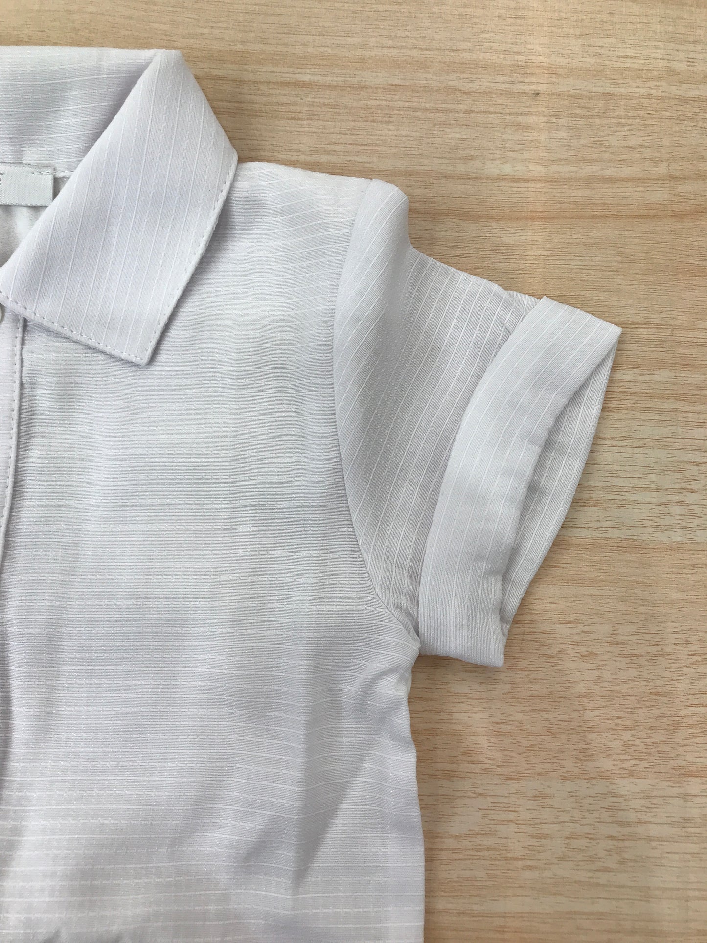 Body Coccodè in cotone mezza manica effetto camicia colletto a punta con bottoncini sul davanti