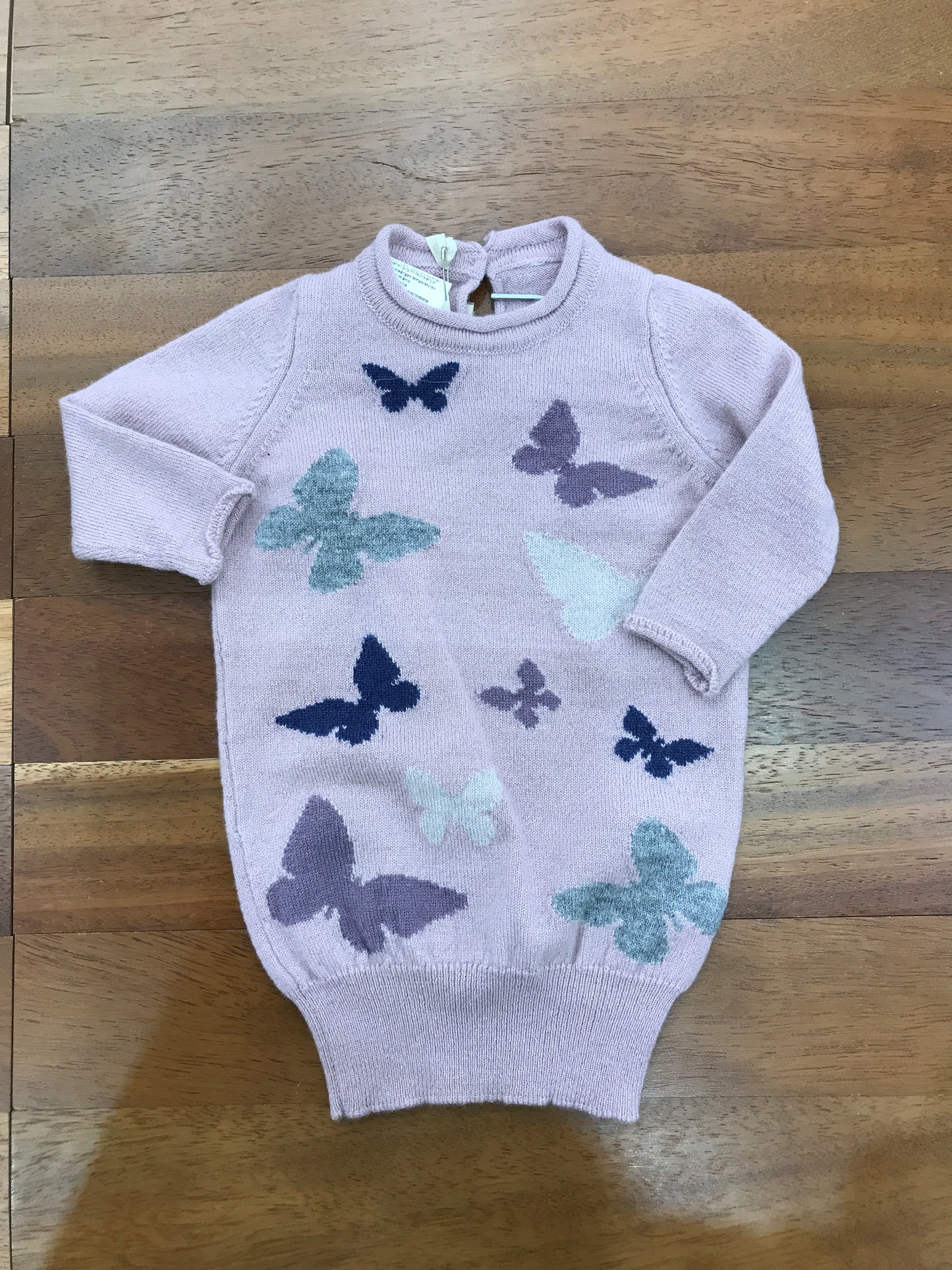 Abitino Mini Kuxo in lana a tubino di colore rosa antico manica lunga con farfalle colorate