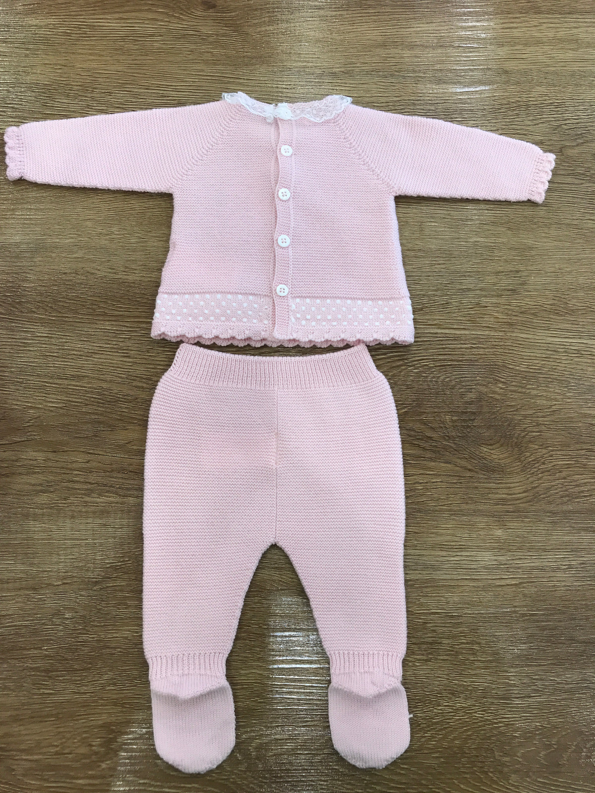 Tutina PCS in lana rosa due pezzi con piedini con applicazione id valancienne e piccolo fiocchetto