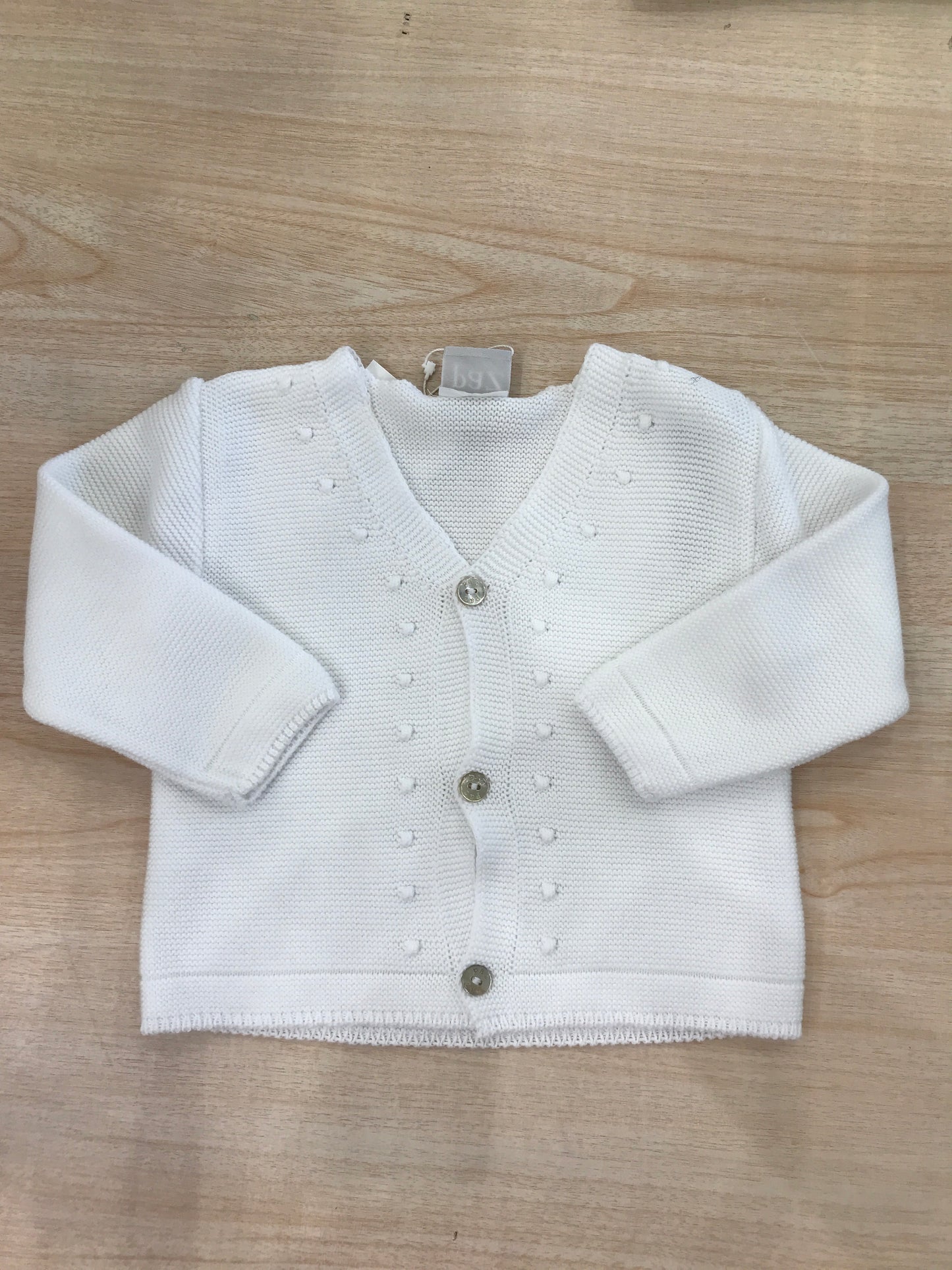 Cardigan Paz Rodriguez in filo bianco con pois in rilievo e piccoli bottoncini