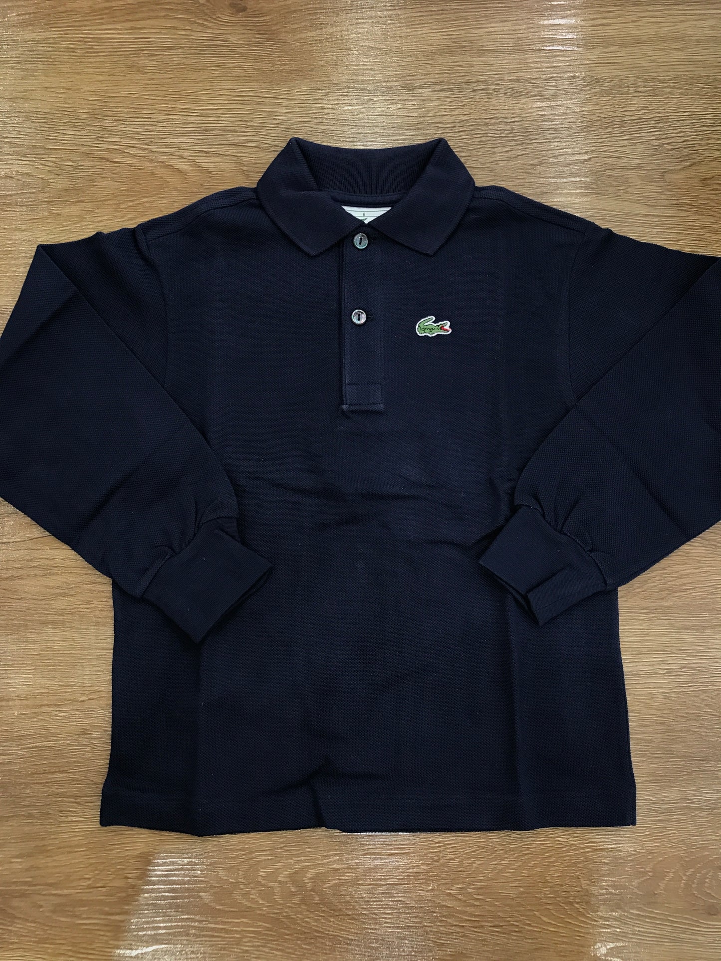 Polo Lacoste manica lunga con polsini e bottoncini